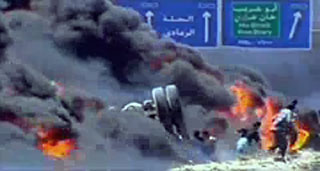 Burning vehicles in Iraq
